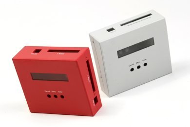 One red and one white custom made plastic enclosure for electronics