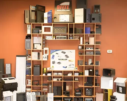 Display wall of custom plastic enclosures, bezels and panels made by Envision
