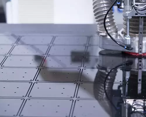 CNC router cutting enclosure blanks from a plastic sheet